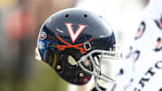 Dec 29, 2018; Charlotte, NC, USA; A Virginia Cavaliers helmet sits on the bench in the second quarter against the South Carolina Gamecocks in the 2018 Belk Bowl at Bank of America Stadium. Mandatory Credit: Jeremy Brevard-Imagn Images