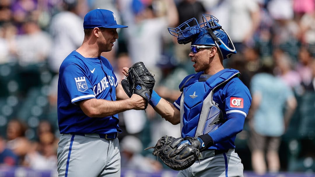 Jul 7, 2024; Denver, Colorado, USA; Kansas City Royals pitcher Kris Bubic (50) reacts with catcher Freddy Fermin (34) after the game against the Colorado Rockies at Coors Field. Mandatory Credit: Isaiah J. Downing-Imagn Images