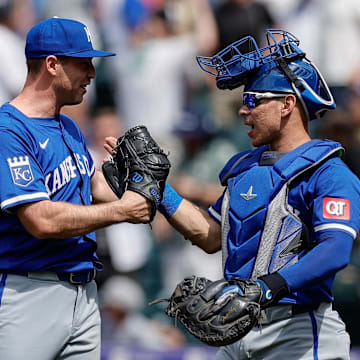 Jul 7, 2024; Denver, Colorado, USA; Kansas City Royals pitcher Kris Bubic (50) reacts with catcher Freddy Fermin (34) after the game against the Colorado Rockies at Coors Field. Mandatory Credit: Isaiah J. Downing-Imagn Images