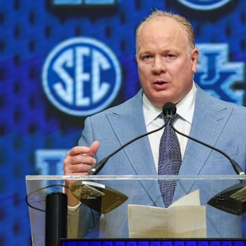 Jul 17, 2025; Atlanta, GA, USA; Kentucky Wildcats head coach Mark Stoops talks to the media during the SEC Media Days at Omni Atlanta Hotel. Mandatory Credit: Jordan Godfree-Imagn Images
