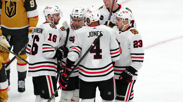 Apr 16, 2024; Las Vegas, Nevada, USA; Chicago Blackhawks center Jason Dickinson (16) celebrates with team mates after scoring a goal against the Vegas Golden Knights during the third period at T-Mobile Arena. Mandatory Credit: Stephen R. Sylvanie-USA TODAY Sports