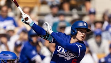 Feb 20, 2025; Phoenix, Arizona, USA; Los Angeles Dodgers second baseman Hyeseong Kim against the Chicago Cubs during a spring training game at Camelback Ranch-Glendale. Mandatory Credit: Mark J. Rebilas-Imagn Images