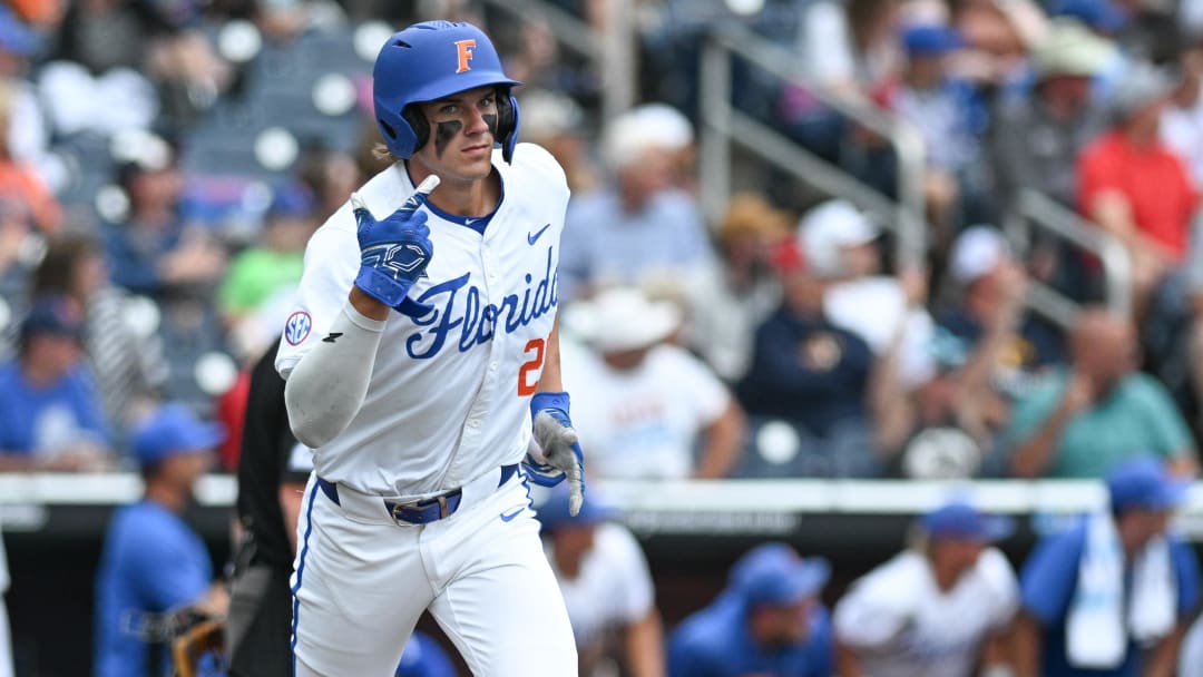 Jun 19, 2024; Omaha, NE, USA;  Florida Gators designated hitter Brody Donay (29) signals after hitting a home run against the Kentucky Wildcats during the fifth inning at Charles Schwab Field Omaha. Mandatory Credit: Steven Branscombe-USA TODAY Sports