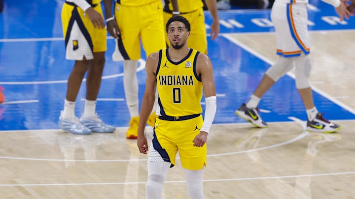 Tyrese Haliburton walks toward the team bench during the NBA Finals.
