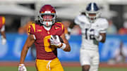 Sep 6, 2025; Los Angeles, California, USA;  USC Trojans wide receiver Makai Lemon (6) runs down field for a touchdown on a pass play during the first half against the Georgia Southern Eagles at the Los Angeles Memorial Coliseum. Mandatory Credit: Jayne Kamin-Oncea-Imagn Images