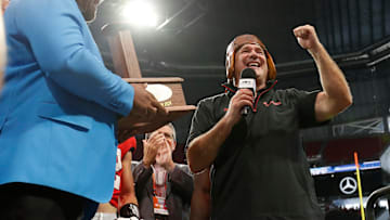 Georgia coach Kirby Smart celebrates after winning the NCAA Aflac Kickoff Game in Atlanta, on Saturday, Aug. 31, 2024. Georgia won 34-3.