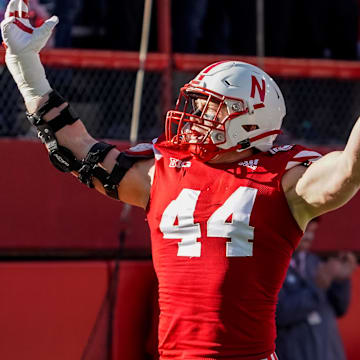 Nov 5, 2022; Lincoln, Nebraska, USA; Nebraska Cornhuskers defensive end Garrett Nelson (44) celebrates after a stop against the Minnesota Golden Gophers during the first quarter at Memorial Stadium. Mandatory Credit: Dylan Widger-Imagn Images