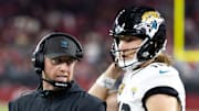 Nov 23, 2025; Glendale, Arizona, USA; Jacksonville Jaguars head coach Liam Coen with quarterback Trevor Lawrence (16) against the Arizona Cardinals at State Farm Stadium. Mandatory Credit: Mark J. Rebilas-Imagn Images