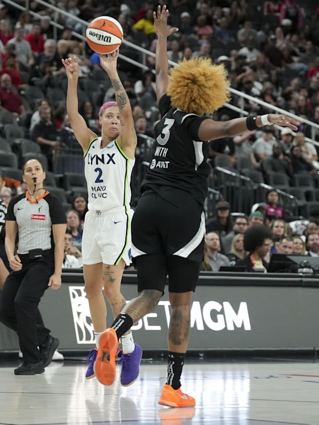 Minnesota Lynx guard Natisha Hiedeman (2) shoots against Las Vegas Aces forward NaLyssa Smith