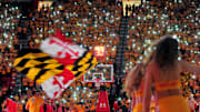 Feb 11, 2017; College Park, MD, USA; Maryland Terrapins fans shine lights in the crowd prior to the game against the Ohio State Buckeyes at Xfinity Center. Mandatory Credit: Evan Habeeb-Imagn Images