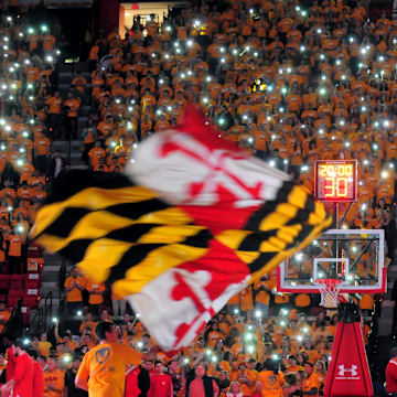 Feb 11, 2017; College Park, MD, USA; Maryland Terrapins fans shine lights in the crowd prior to the game against the Ohio State Buckeyes at Xfinity Center. Mandatory Credit: Evan Habeeb-Imagn Images