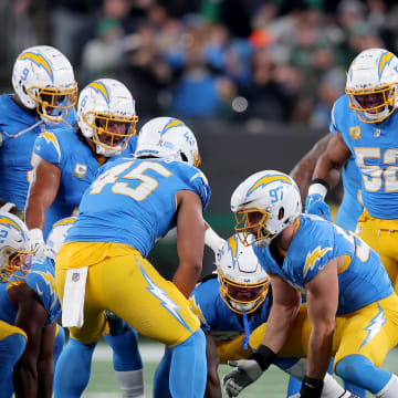 Nov 6, 2023; East Rutherford, New Jersey, USA; Los Angeles Chargers linebacker Joey Bosa (97) celebrates with teammates after recovering a New York Jets fumble during the first quarter at MetLife Stadium. Mandatory Credit: Brad Penner-USA TODAY Sports