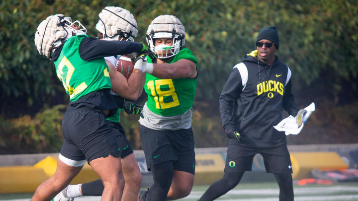 New co-defensive coordinator and safeties coach Chris Hampton, right, joins the first practice of spring for Oregon football as they prepare for the 2023 season.

Eug 031623 Uo Spring Fb 06