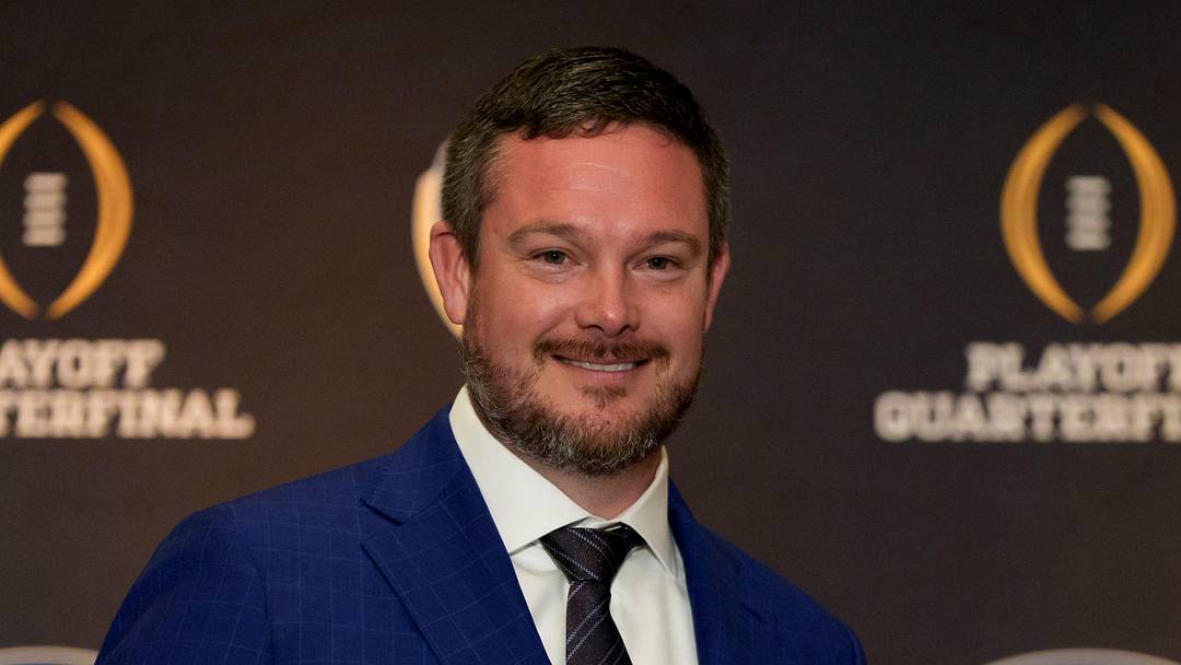 Oregon head coach Dan Lanning holds an orange during the head coaches press conference ahead of Orange Bowl on Dec. 31, 2025, in Dania Beach, Florida.
