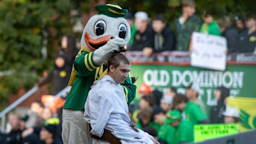 The Duck shaves a fans head during ESPN’s “College GameDay” Saturday, Oct. 12, 2024 on the campus of the University of Oregon in Eugene, Ore.