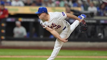 Aug 25, 2025; New York City, New York, USA; New York Mets pitcher Ryan Helsley (56) delivers a pitch against the Philadelphia Phillies during the eighth inning at Citi Field. Mandatory Credit: Gregory Fisher-Imagn Images