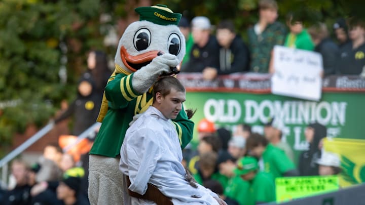 The Duck shaves a fans head during ESPN’s “College GameDay” Saturday, Oct. 12, 2024 on the campus of the University of Oregon in Eugene, Ore.
