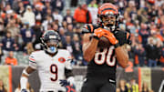 Nov 2, 2025; Cincinnati, Ohio, USA; Cincinnati Bengals wide receiver Andrei Iosivas (80) catches a 9-yard touchdown pass thrown by quarterback Joe Flacco (not pictured) against Chicago Bears safety Jaquan Brisker (9) during the fourth quarter at Paycor Stadium. Mandatory Credit: Joseph Maiorana-Imagn Images