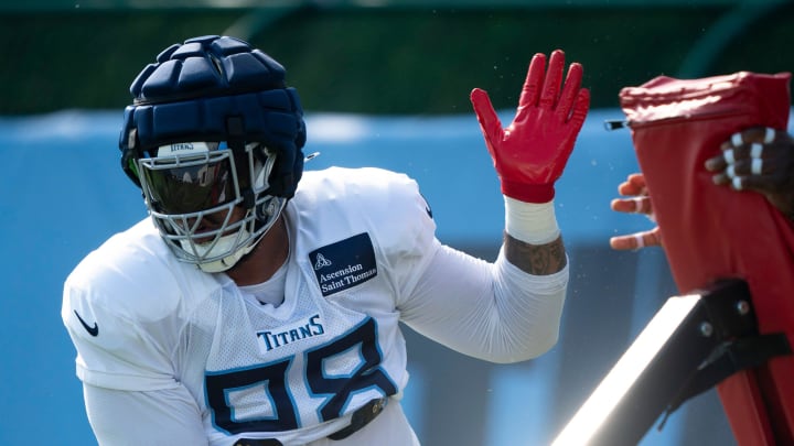 The Tennessee Titans Jeffrey Simmons (98) releases the pads during the Tennessee Titans training camp at Ascension Saint Thomas Sports Park in Nashville, Tenn., Tuesday, July 30, 2024.