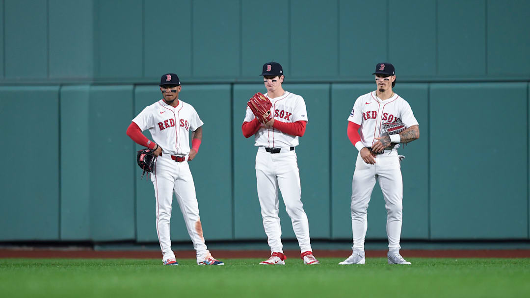 Red Sox outfielders Ceddanne Rafaela, Jarren Duran and Roman Anthony watch from the outfield during a game versus the Rays.
