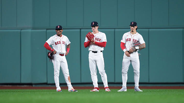 Red Sox outfielders Ceddanne Rafaela, Jarren Duran and Roman Anthony watch from the outfield during a game versus the Rays.