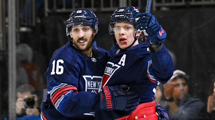 Apr 9, 2025; New York, New York, USA;  New York Rangers left wing Artemi Panarin (10) celebrates his goal with New York Rangers center Vincent Trocheck (16) against the Philadelphia Flyers during the second period at Madison Square Garden. Mandatory Credit: Dennis Schneidler-Imagn Images