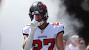Sep 22, 2024; Tampa, Florida, USA; Tampa Bay Buccaneers cornerback Zyon McCollum (27) runs out of the tunnel during the first quarter against the Denver Broncos at Raymond James Stadium. Mandatory Credit: Kim Klement Neitzel-Imagn Images