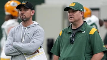 Packers head coach Matt LaFleur, left, talks with general manager Brian Gutekunst during organized team activities in Green Bay, Wisconsin on May 23, 2023.