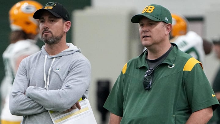 Packers head coach Matt LaFleur, left, talks with general manager Brian Gutekunst during organized team activities in Green Bay, Wisconsin on May 23, 2023.