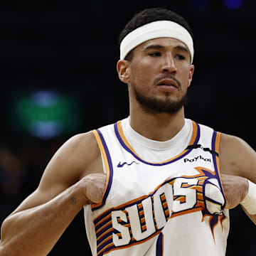 Apr 4, 2025; Boston, Massachusetts, USA; Phoenix Suns guard Devin Booker (1) during the second quarter against the Boston Celtics at TD Garden. Mandatory Credit: Winslow Townson-Imagn Images