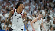 Mar 5, 2025; Storrs, Connecticut, USA; UConn Huskies guard Solo Ball (1) reacts after his three point basket against the Marquette Golden Eagles in the first half at Harry A. Gampel Pavilion. Mandatory Credit: David Butler II-Imagn Images