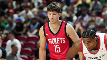 Jul 14, 2024; Las Vegas, NV, USA; Houston Rockets guard Reed Sheppard (15) and Washington Wizards forward Alex Sarr (12) await a free throw attempt during the second quarter at Thomas & Mack Center. Mandatory Credit: Stephen R. Sylvanie-USA TODAY Sports