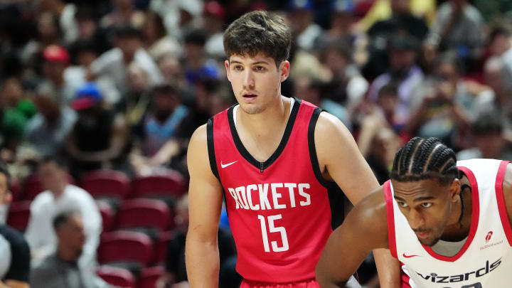 Jul 14, 2024; Las Vegas, NV, USA; Houston Rockets guard Reed Sheppard (15) and Washington Wizards forward Alex Sarr (12) await a free throw attempt during the second quarter at Thomas & Mack Center. Mandatory Credit: Stephen R. Sylvanie-USA TODAY Sports