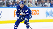 Toronto Maple Leafs center Auston Matthews skates with the puck against the Florida Panthers.