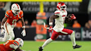 Oct 17, 2025; Miami Gardens, Florida, USA; Louisville Cardinals running back Isaac Brown (1) carries the football against Miami Hurricanes during the third quarter at Hard Rock Stadium. Mandatory Credit: Sam Navarro-Imagn Images