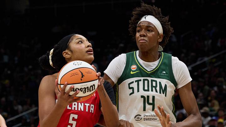 Jun 27, 2026; Seattle, Washington, USA; Atlanta Dream forward Angel Reese (5) drives the ball to the basket in the first quarter against the Seattle Storm at Climate Pledge Arena. Mandatory Credit: Richard Dizon-Imagn Images