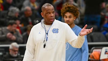 Mar 20, 2025; Milwaukee, WI, USA; North Carolina Tar Heels head coach Hubert Davis watches team workout during NCAA Tournament First Round Practice at Fiserv Forum. Mandatory Credit: Benny Sieu-Imagn Images