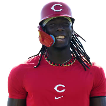 Cincinnati Reds shortstop Elly De La Cruz smiles during live batting practice during spring training workouts, Saturday, Feb. 17, 2024, at the team's spring training facility in Goodyear, Ariz.
