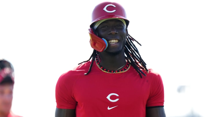 Cincinnati Reds shortstop Elly De La Cruz smiles during live batting practice during spring training workouts, Saturday, Feb. 17, 2024, at the team's spring training facility in Goodyear, Ariz.