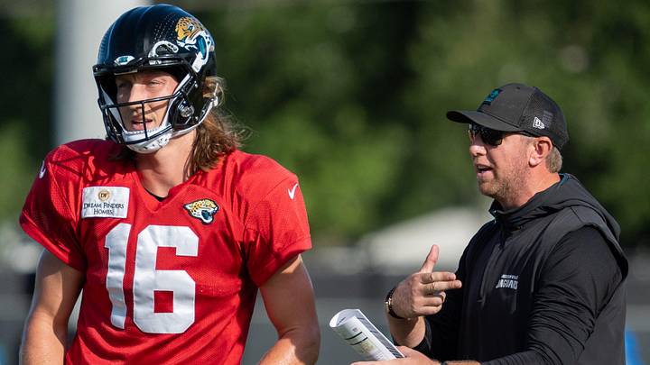 Jacksonville Jaguars quarterback Trevor Lawrence (16) gets coached by Jaguars Head Coach Liam Coen during the Jaguars 14th NFL training camp session at Miller Electric Center Tuesday August 12, 2025 in Jacksonville, Fla. The Jaguars travel to New Orleans to play the Saints this Sunday in their second preseason game. 