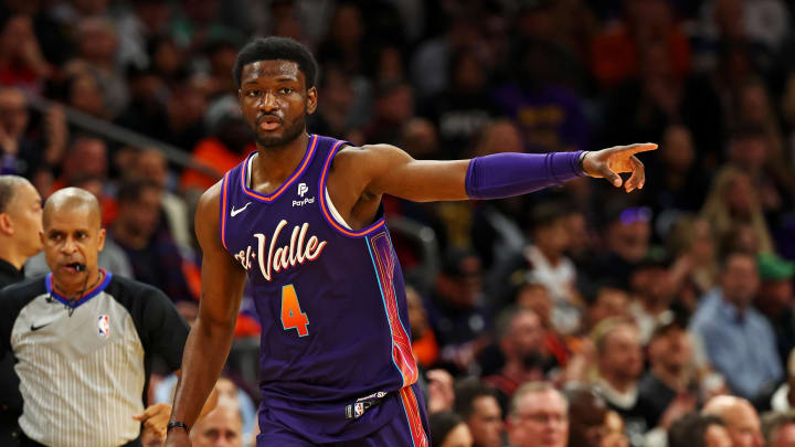 Jan 3, 2024; Phoenix, Arizona, USA; Phoenix Suns forward Chimezie Metu (4) celebrates after a play during the first quarter against the LA Clippers at Footprint Center. Mandatory Credit: Mark J. Rebilas-USA TODAY Sports