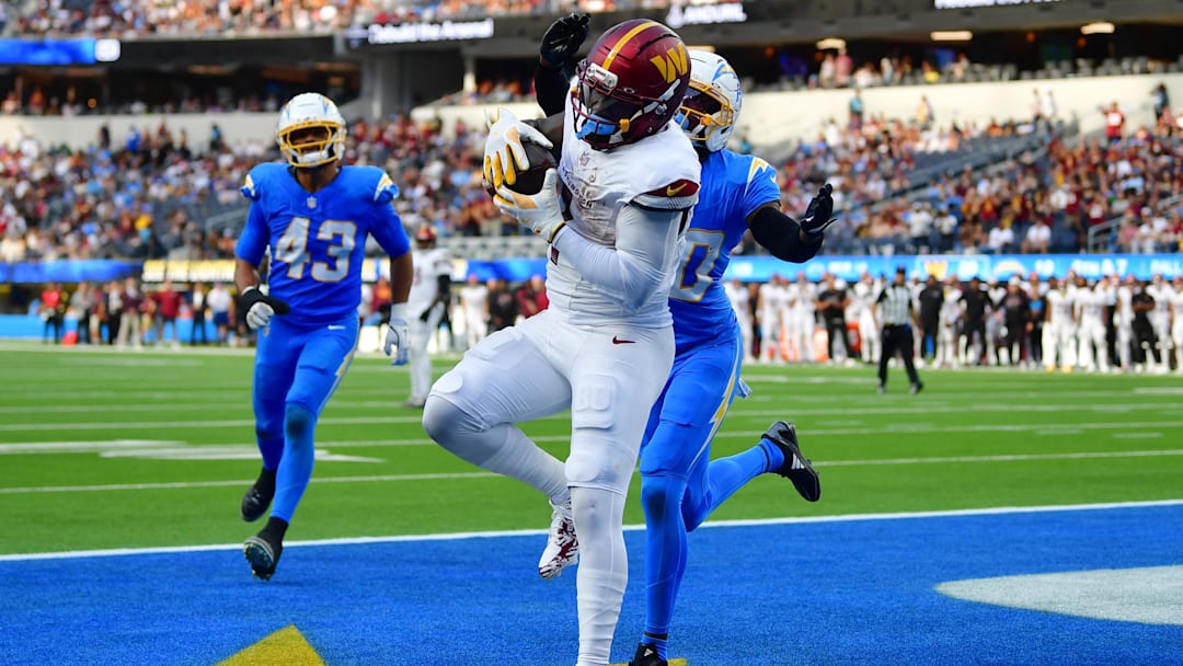 Oct 5, 2025; Inglewood, California, USA; Washington Commanders wide receiver Deebo Samuel Sr. (1) makes a catch for a touchdown against the Los Angeles Chargers in the second half at SoFi Stadium. Mandatory Credit: Gary A. Vasquez-Imagn Images