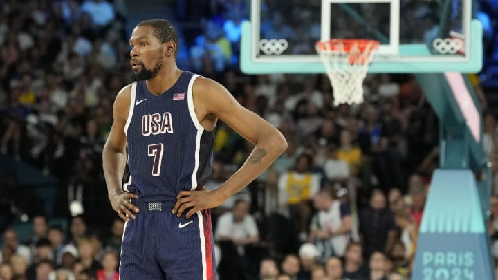 Aug 6, 2024; Paris, France; United States guard Kevin Durant (7) looks on in the first half against Brazil in a men’s basketball quarterfinal game during the Paris 2024 Olympic Summer Games at Accor Arena. Mandatory Credit: Kyle Terada-USA TODAY Sports