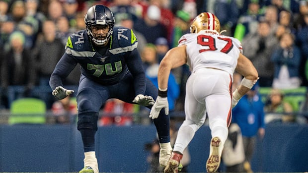 Seattle Seahawks offensive tackle George Fant (74) against San Francisco 49ers defensive end Nick Bosa (97).
