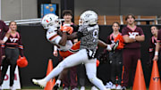 Nov 22, 2025; Blacksburg, Va.; Miami wide receiver Malachi Toney (10) catches a pass for a touchdown as Virginia Tech cornerback Isaiah Brown-Murray (9) defends.