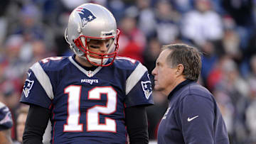 Jan 16, 2016; Foxborough, MA, USA; New England Patriots quarterback Tom Brady (12) talks with New England Patriots head coach Bill Belichick before the game against the Kansas City Chiefs in the AFC Divisional round playoff game at Gillette Stadium. Mandatory Credit: Robert Deutsch-Imagn Images