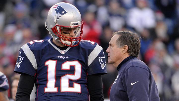 Jan 16, 2016; Foxborough, MA, USA; New England Patriots quarterback Tom Brady (12) talks with New England Patriots head coach Bill Belichick before the game against the Kansas City Chiefs in the AFC Divisional round playoff game at Gillette Stadium. Mandatory Credit: Robert Deutsch-Imagn Images