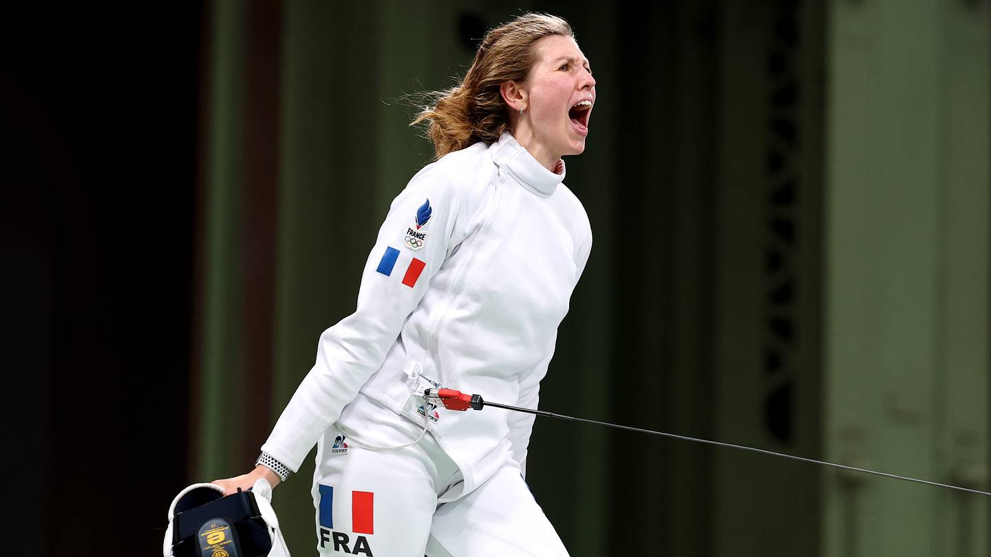 Why Are Olympic Fencers Attached to Cables?
