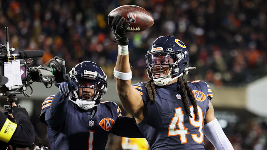 Chicago Bears linebacker Tremaine Edmunds (49) poses for a television camera with cornerback Jaylon Johnson (1).