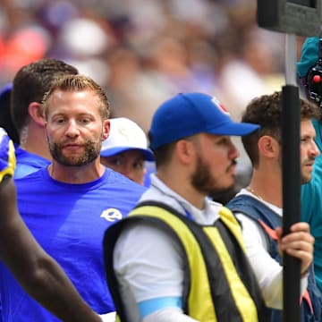 Aug 11, 2024; Inglewood, California, USA; Los Angeles Rams head coach Sean McVay speaks with wide receiver Tyler Johnson (18) during the first half at SoFi Stadium. Mandatory Credit: Gary A. Vasquez-Imagn Images